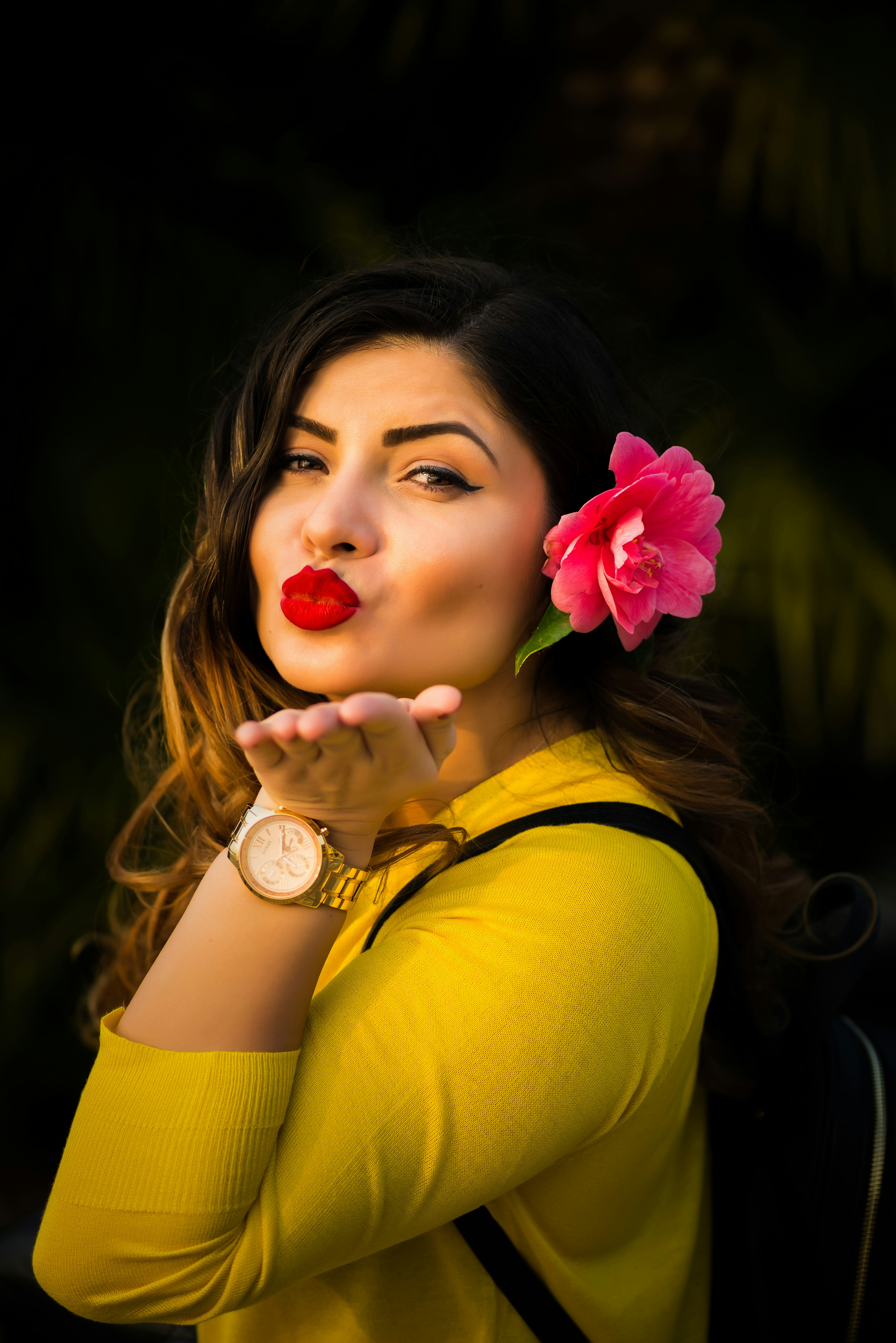 woman wearing yellow elbow-sleeved shirt